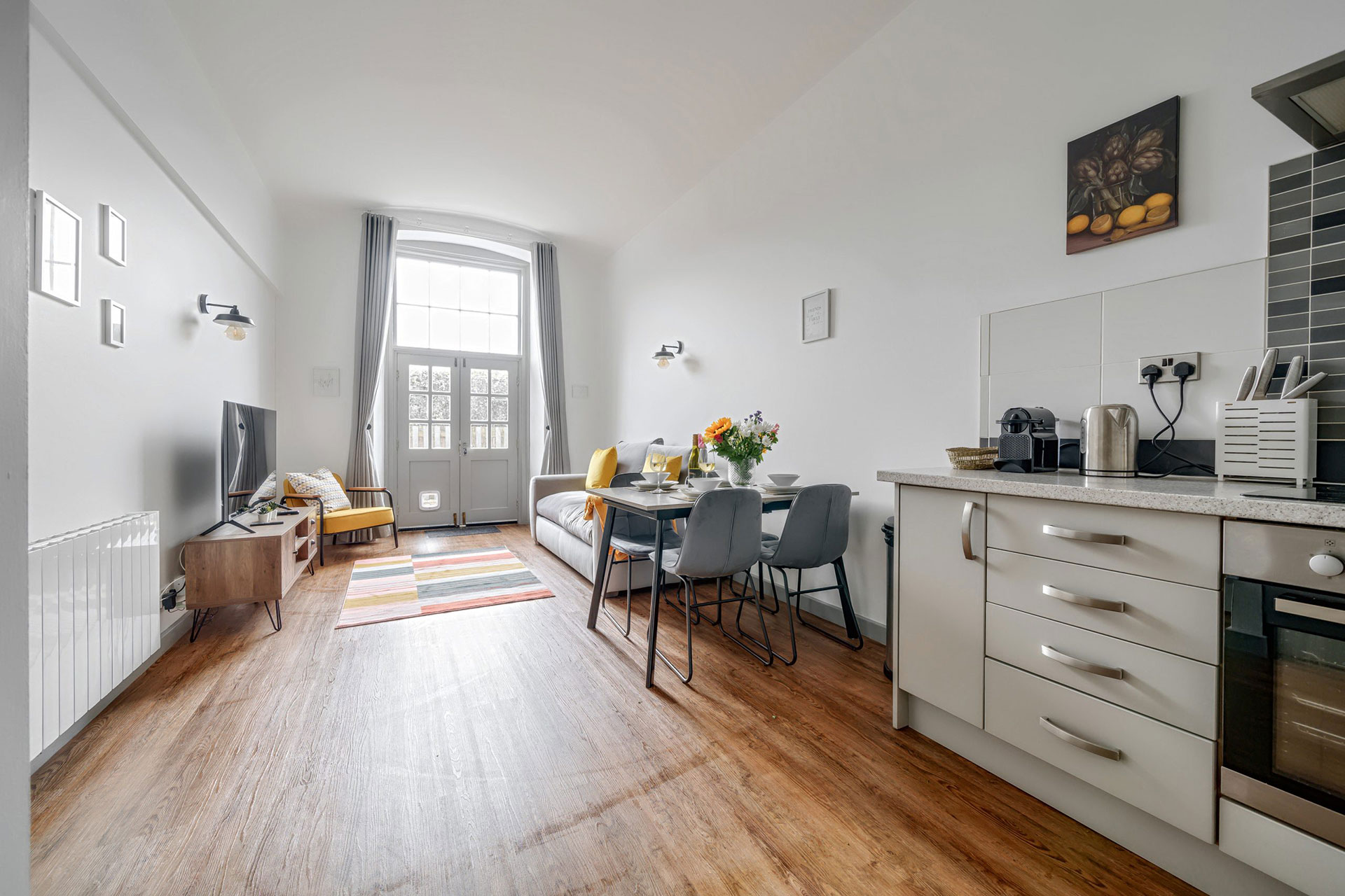 County House Escape, York, living space and kitchen